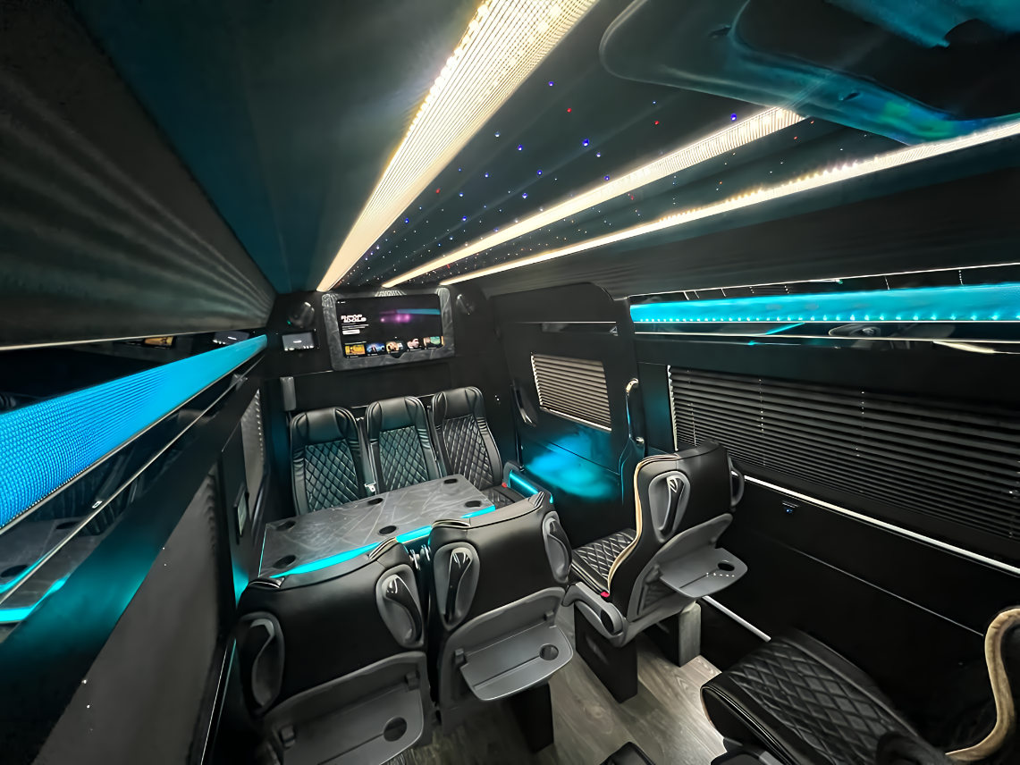 Forward facing leather seating inside a Mercedes Sprinter