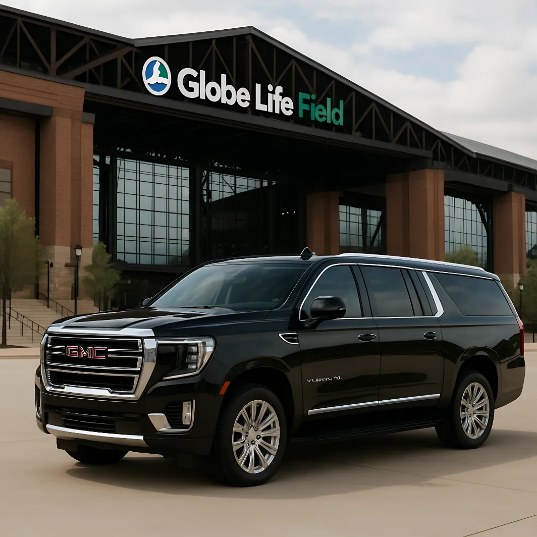 Black GMC Yukon XL at Globe Life Field in Arlington for Texas Rangers game VIP transportation
