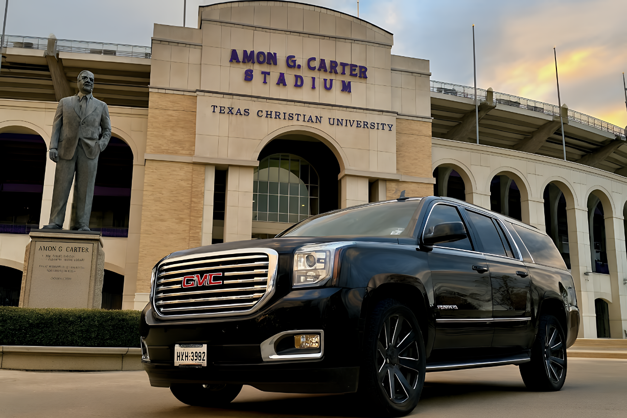 GMC Yukon XL parked outside a major Texas stadium